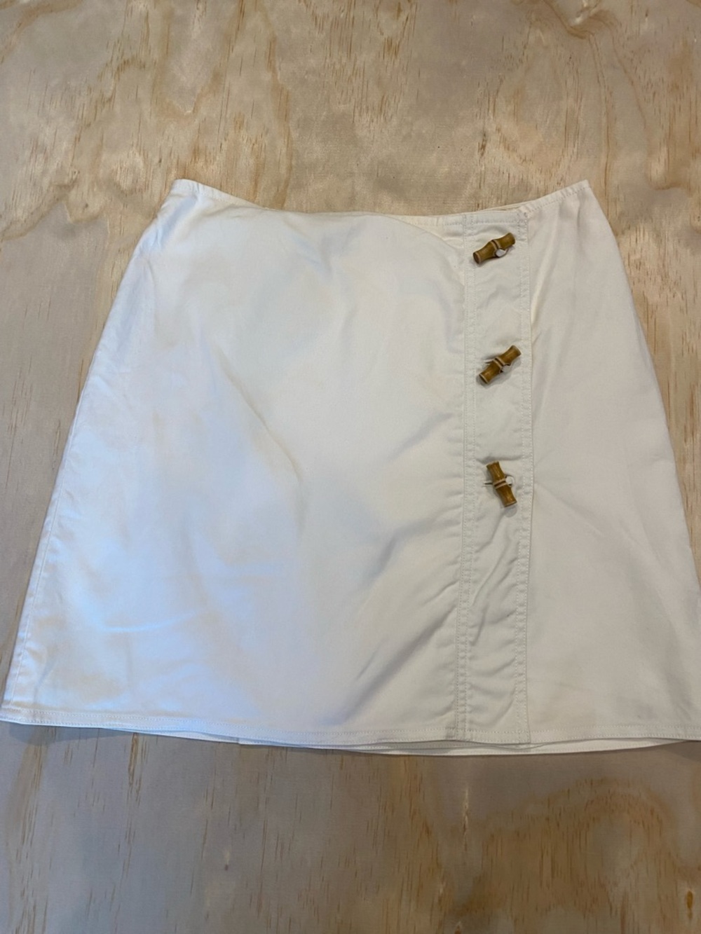 Michael Kors White Mini Skirt with Bamboo-Style Button Detail